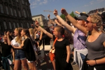 School children give the Danish parliament the finger in protest of unpopular school rform
